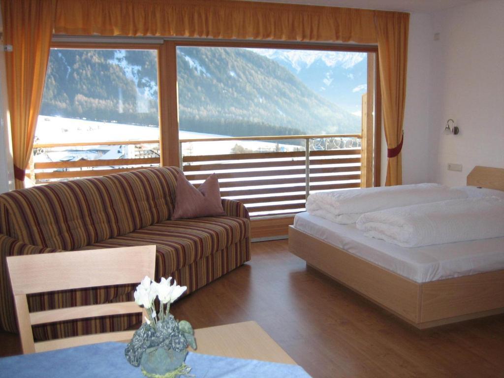 Garni - Appartement Neumairhof Oberrasen Zimmer foto